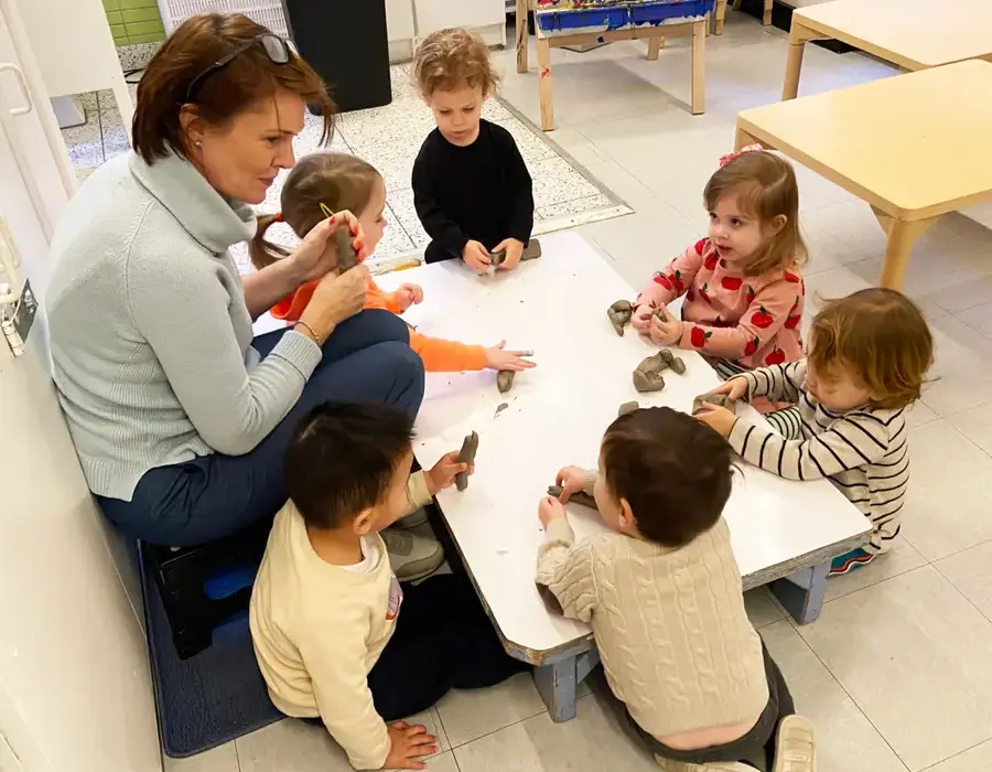 young-students-doing-activities-with-teacher